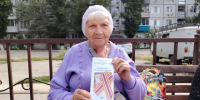 Патриотическая акция «Муаровая лента» прошла в центре соцобслуживания. - Пугачёвский район
