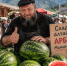Мужчина продает арбузы / Фото: создано в нейросети ChatGPT - ИА Амител