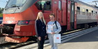 В Кузбассе поздравили пассажира, купившего 200-тысячный билет на пригородный поезд через чат-бот в МАКС - Город Мыски
