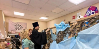 Священник принял участие в праздновании годовщины открытия мастерской плетения маскировочных сетей в Мегионе - Ханты-Мансийская Митрополия