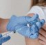 doctor-with-gloves-preparing-vaccine-woman - ТРК Щелково