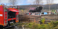 пожарная машина тушит возгорание - ИА Nord-News.Ru