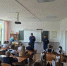 Пожарный в кабинете проводит открытый урок для школьников - Министерство гражданской обороны и чрезвычайных ситуаций