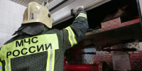 Крыша гаража обрушилась во время пожара в томском поселке - Комсомольская Правда