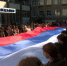 Воронежские студенты развернули 30-метровый флаг страны в честь годовщины воссоединения новых регионов с Россией - TV-Gubernia.Ru