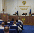 Зал заседаний прокуратуры с трибуной, гербом и надписью «Прокуратура Ивановской области», люди в светлой форме в аудитории. - 168.Ru