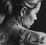 one-beautiful-woman-tattooed-exudes-confidence-generated-by-ai - РИА 7 Новостей