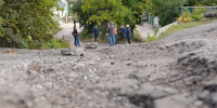 Ямы на дорогах частного сектора в Воронеже засыпали щебнем вместо ремонта - ГТРК Воронеж