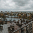 Пасмурное небо над мокрыми после дождя крышами тихого жилого квартала в Нижнем Новгороде - Newsroom24.Ru
