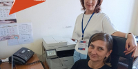 Юлия С. за работой в редакции газеты - Министерство труда и соцразвития