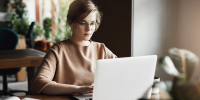work-lifestyle-business-concept-good-looking-focused-european-female-trendy-glasses-sitting-cafe-near-laptop-working-notebook-surrounded-with-books-making-notes - ТРК Щелково