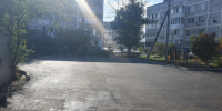 Выполнены работы по ремонту парковки и проездов к домам по улице Энгельса №27 и №29 в пгт Мостовской - Администрация Мостовского гп
