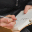 close-up-guy-writing-notebook.jpg - Центр Мой бизнес
