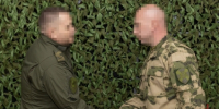 Командующий группировкой войск национальной гвардии в ДНР вручил ведомственные награды отличившимся росгвардейцам - Росгвардия