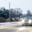 car-speeds-along-winter-highway-with-headlights-winter-roadtrip-motion.jpg - Gorod3466.Ru