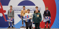 На высшей ступени пьедестала Чечен Чейнин. Фото: Академия борьбы имени Дмитрия Миндиашвили - Газета Алтайский спорт