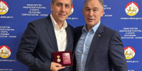 Награда за заслуги в развитии физкультуры и спорта - СОГМА
