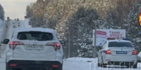 Мощный снегопад спровоцировал транспортный коллапс на трассе "Сибирь" в Приангарье - IrkutskMedia.Ru