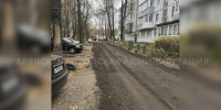 Контрактник из Брянска помог отремонтировать дорогу у многоэтажки - БрянскНОВОСТИ.RU